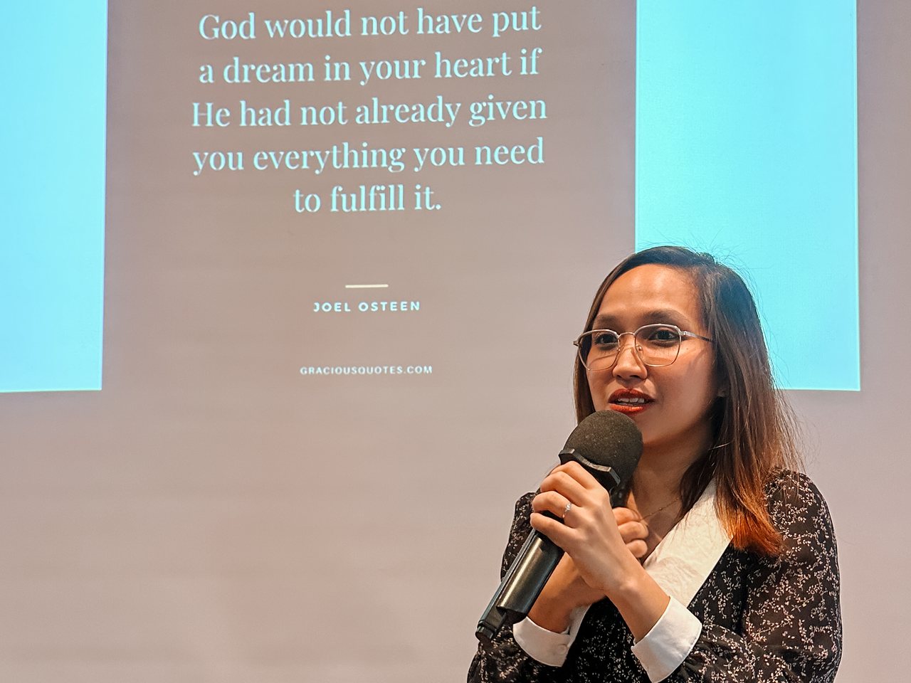Chelsea speaking to professionals during a learning and development session.